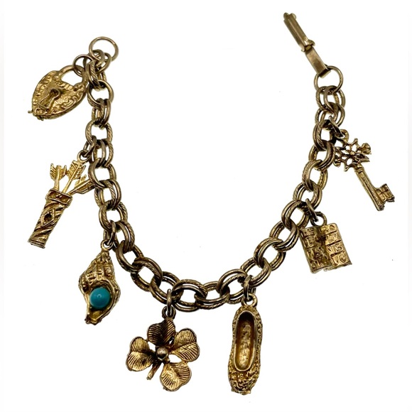 Vintage Jewelry - Vintage Silver Tone Charm Bracelet with 7 Dangling Charms